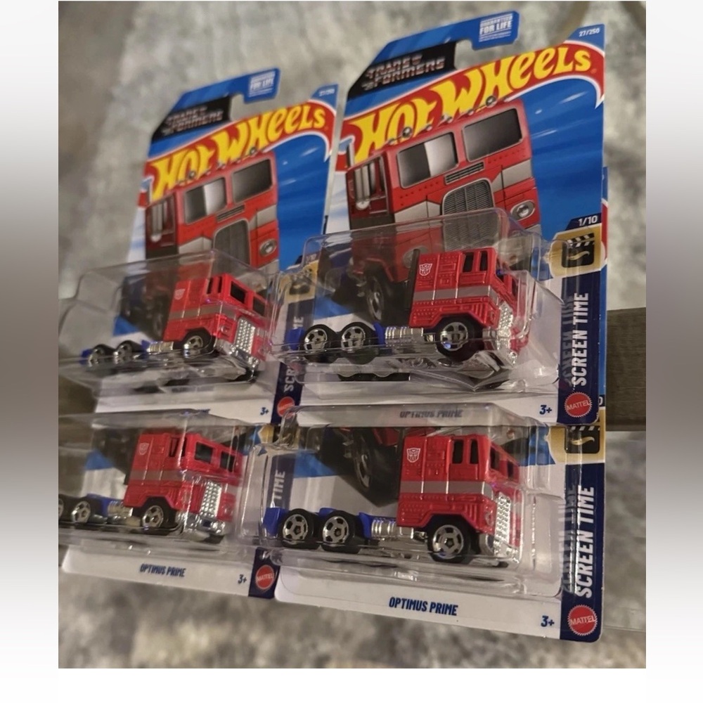 Lot of ( 4 ) x Mattel Hot Wheels Optimus Prime Red Die-Cast Truck Toy